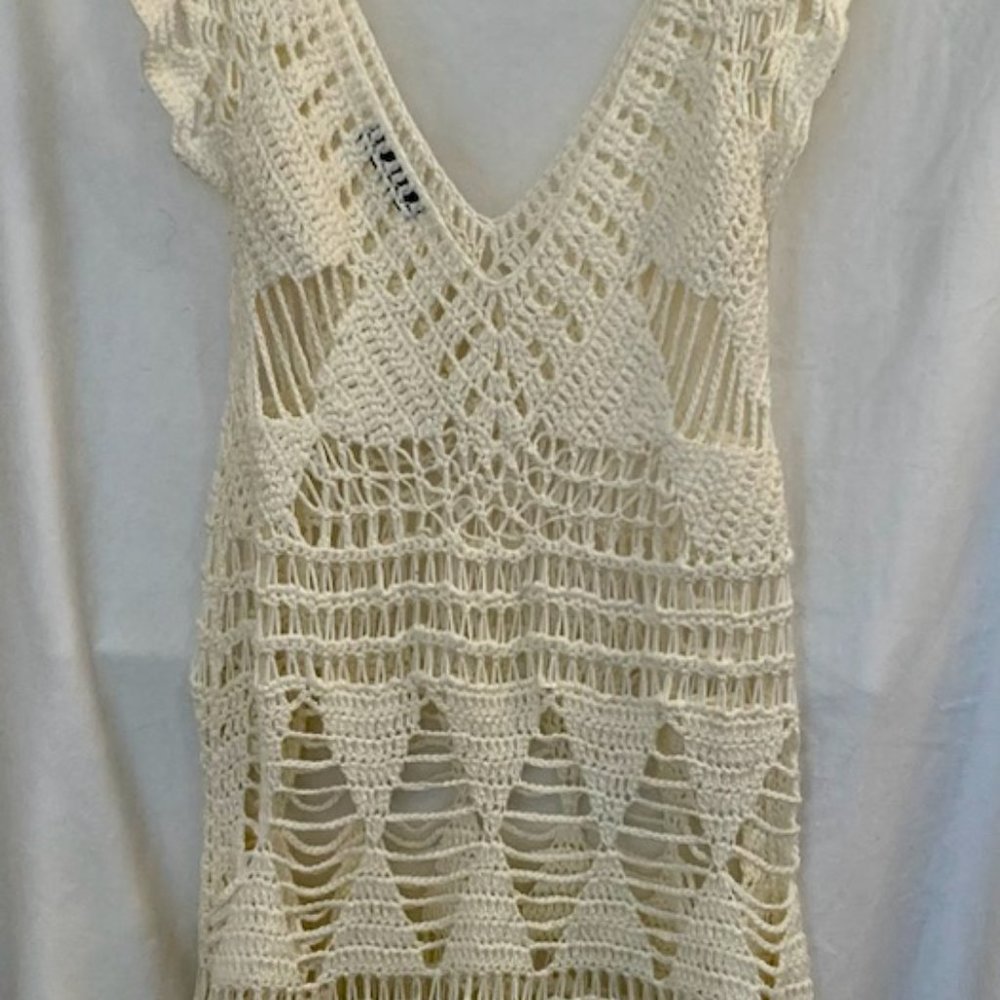 Cream colored crotched top.  Size medium.